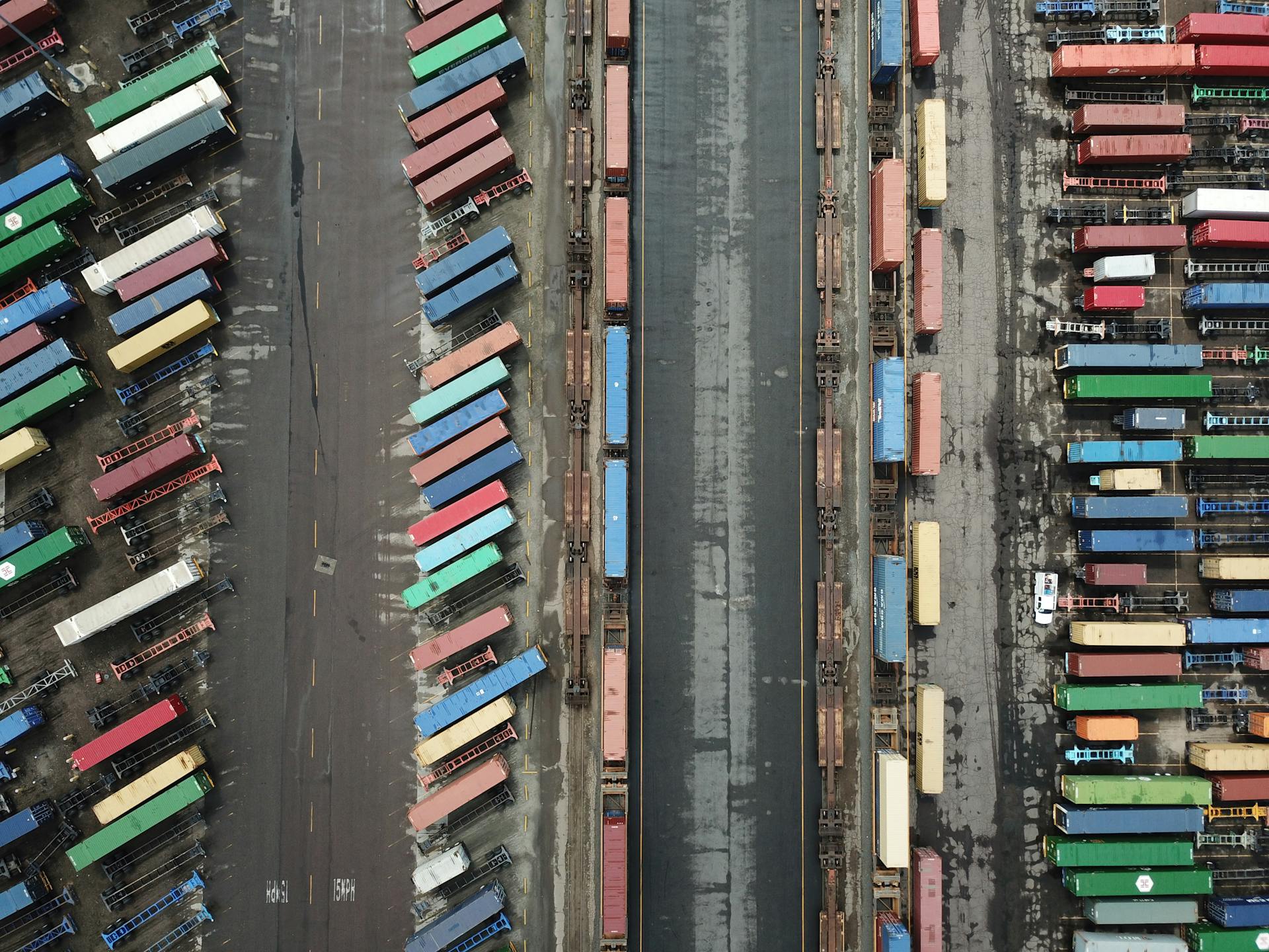 Aerial view of shipping containers and freight infrastructure